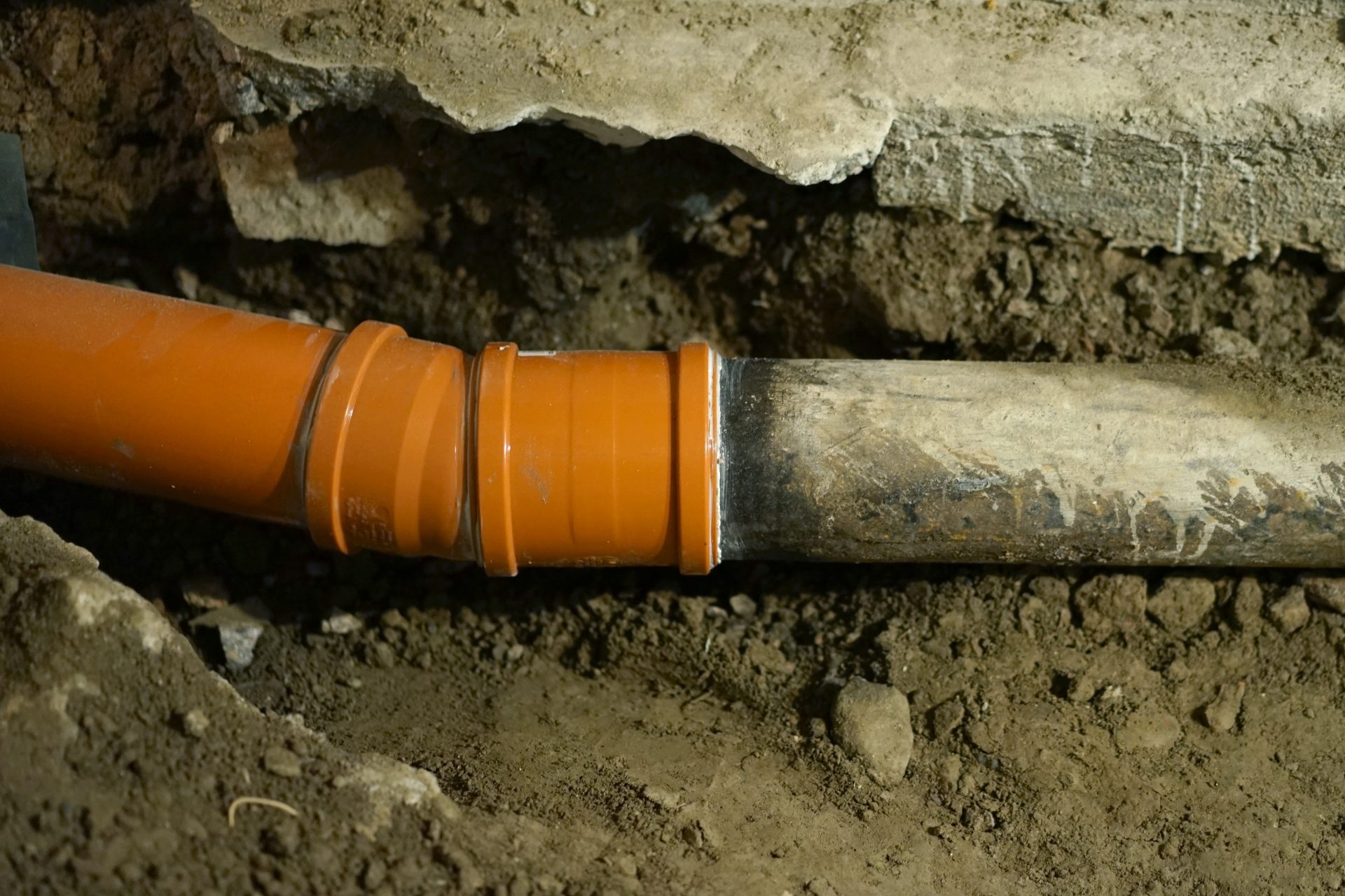 Cast iron and PVC sewer pipe