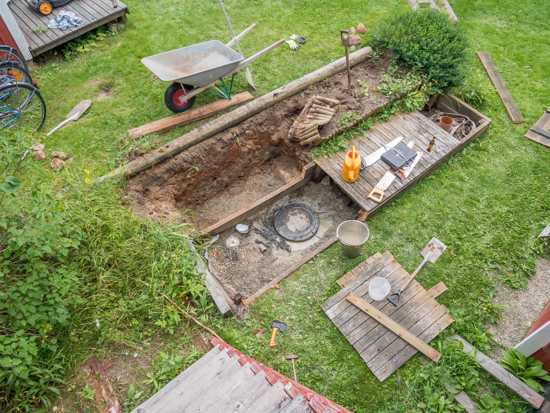Digging For Septic Tank To Replace It In Backyard Of Home