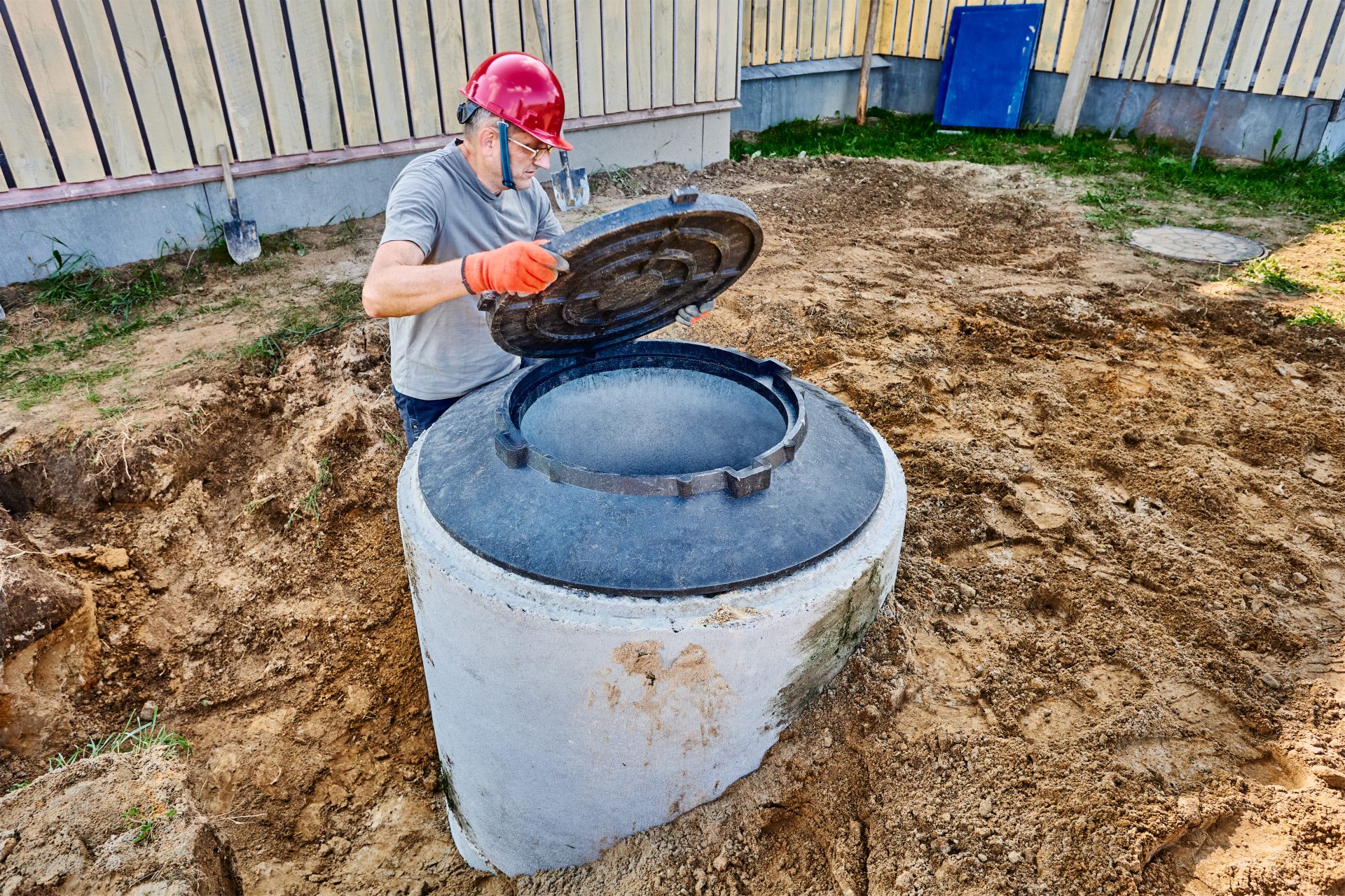 Man working on septic system