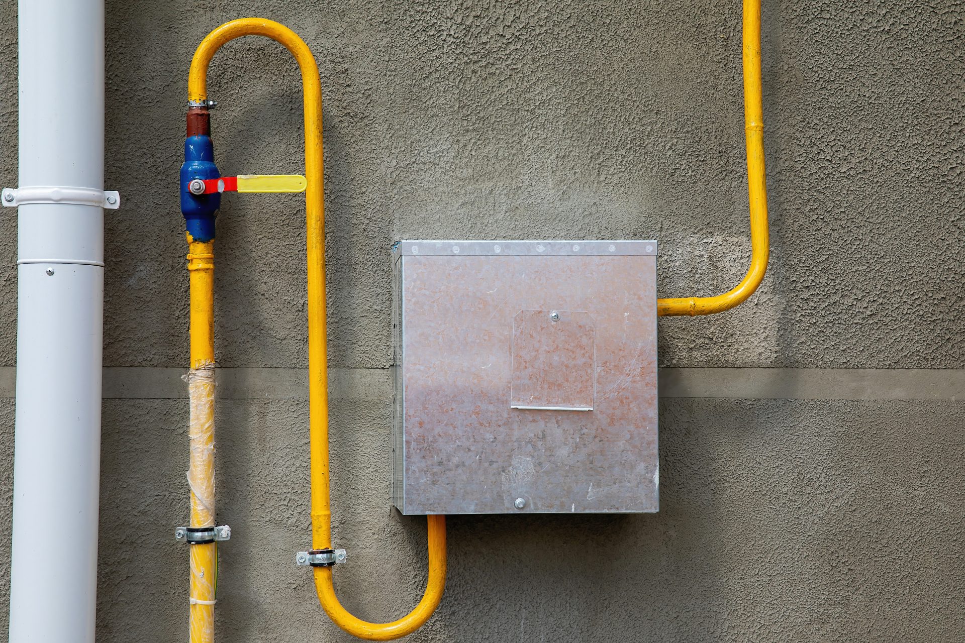 A residential gas line outside of a home.